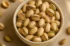 Premium pistachios in bowl with measured portion on warm linen, Ammari Foods cover image